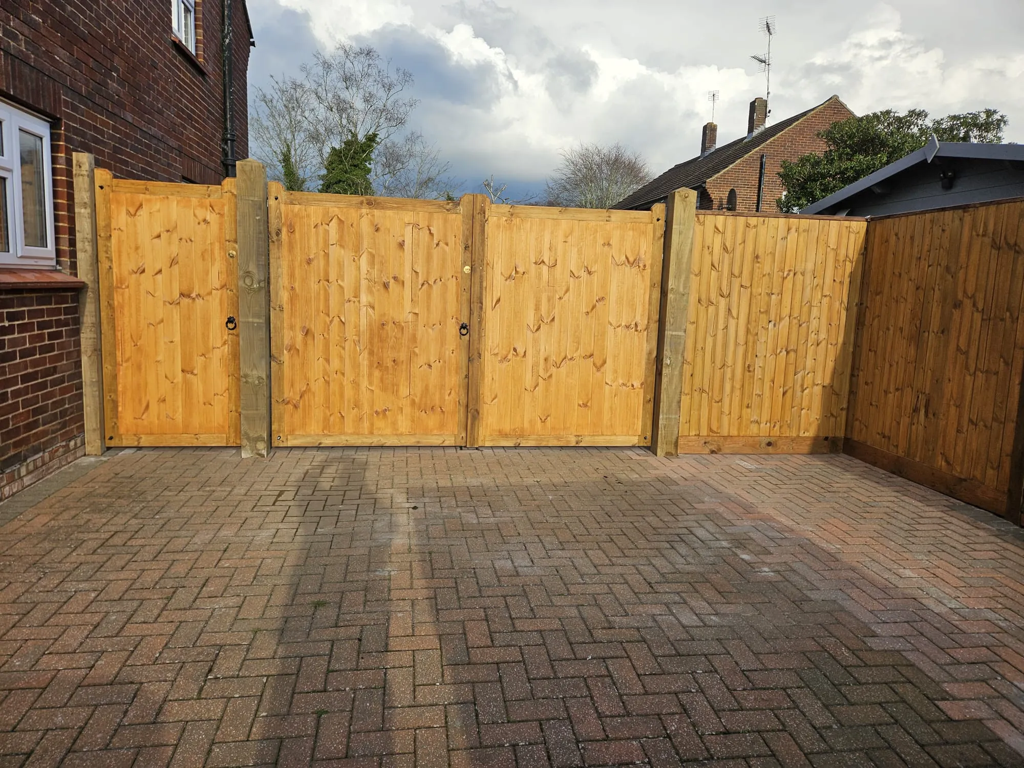New Wooden Fencing Panels being Installed