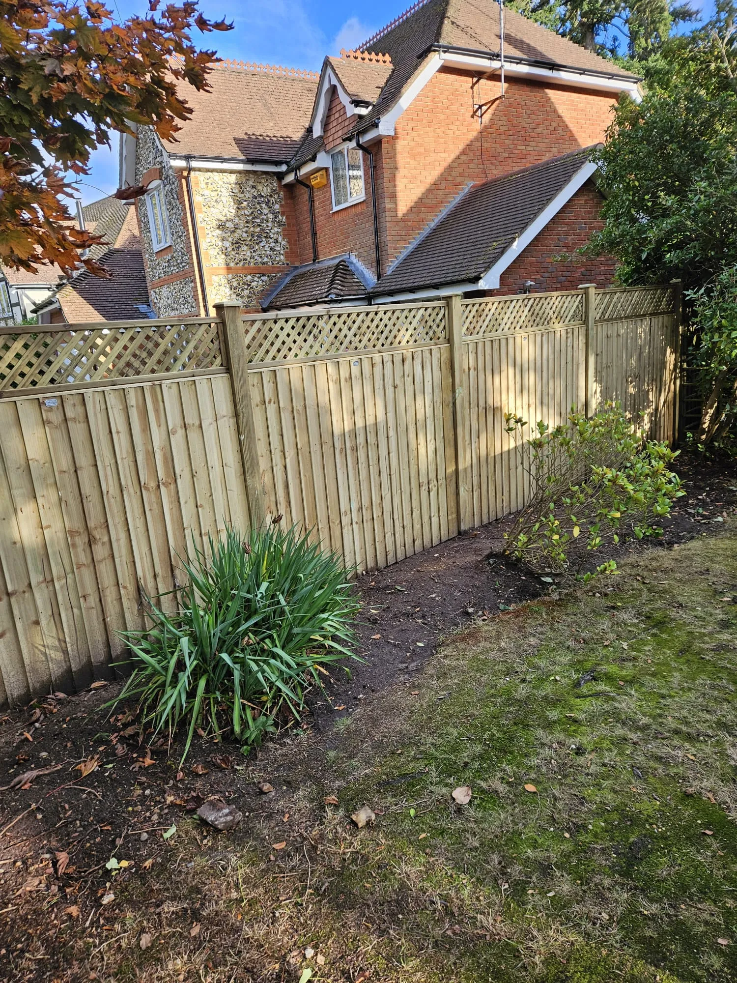 Fencing Panels with House in Background